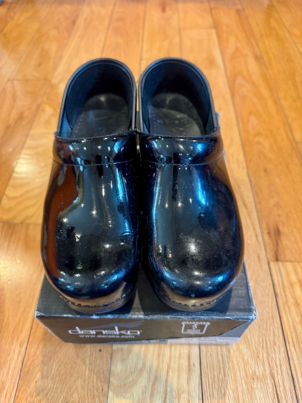 Dansko Black Patent Leather Slip-On Clogs